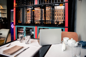So in a cafe with a laptop a glass of water and a glass of ice