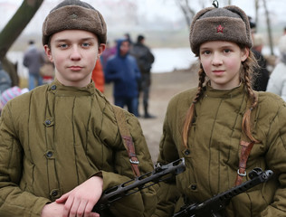 Boy and girl in forime soldiers of the second world war. Children of war