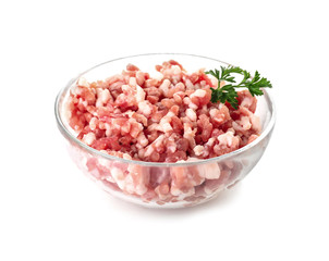 Glass bowl with minced meat and parsley on white background
