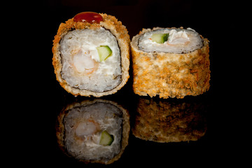 Japanese national popular cuisine. Sushi, rice and fish. Tasty, beautifully served food in a restaurant, cafe, with elements of the original design