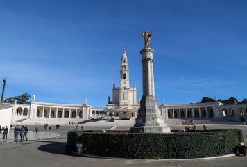 Fototapeta na wymiar Basilica of fatima with a clear sky in summer and the big square in the front