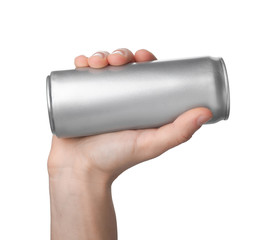 Man holding aluminum can with beverage on white background, closeup. Space for design