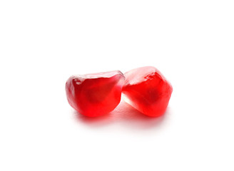 Pomegranate seeds on white background. Delicious fruit