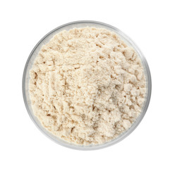 Bowl of sesame flour isolated on white, top view