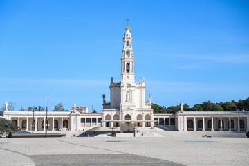 Basilica of fatima with a clear sky in summer and the big square in the front