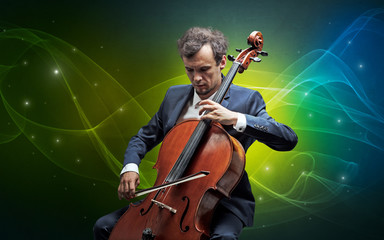 Serious classical cellist with fabled sparkling wallpaper