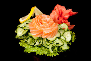 Japanese national popular cuisine. Sushi, rice and fish. Tasty, beautifully served food in a restaurant, cafe, with elements of the original design