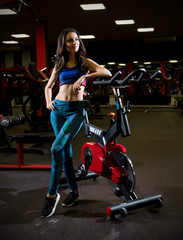 Fototapeta na wymiar Sporty woman in fitness club