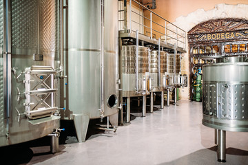 Modern winery with big steel barrels