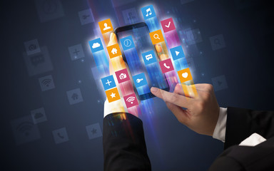 Female hand using smartphone with colorful angular fast switching application icons around