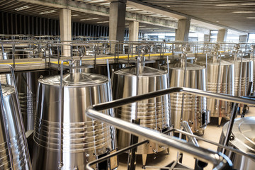 Modern winery with big steel barrels
