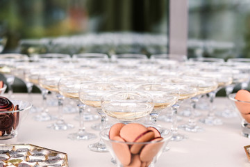 triangle shaped champagne glasses on the table