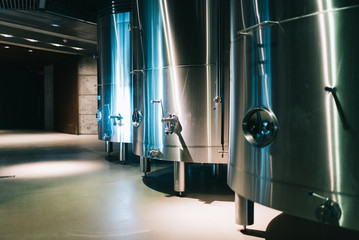 Modern winery with big steel barrels
