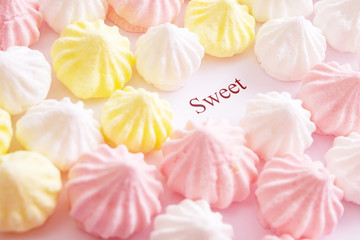 pink white and yellow cakes sweet meringue
