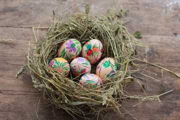 easter eggs and a nest of hay
