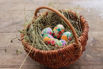 easter eggs and a nest of hay