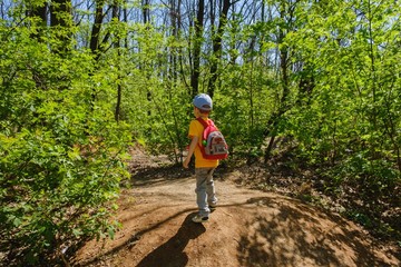 backpack child hiking summer green. kid.