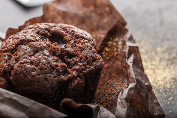 chocolate muffin in baking paper