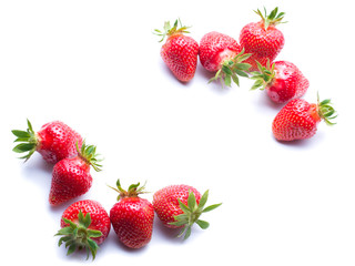 Fresh ripe strawberries isolated on the white background. Strawberry frame.