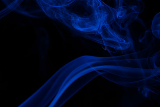 Colorful smoke close-up on a black background