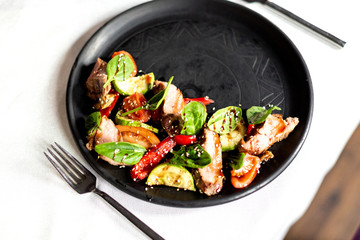 Warm salad with veal