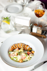 Romain salad with grilled chicken, garlic croutons and parmesan