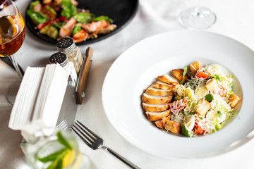 Romain salad with grilled chicken, garlic croutons and parmesan