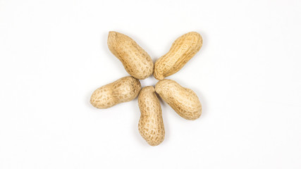 Peanuts on a white background. Peanuts in the shell.
