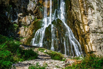 Fototapeta na wymiar The Gega waterfall. The most famous and largest waterfall in Abkhazia.