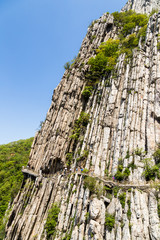 Trail and cliffs in Songshan Mountain, Dengfeng, China. Songshan is the tallest of the 5 sacred mountains of China dedicated to Taoism and stand above the famous Shaolin temple in Henan Province