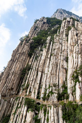Trail and cliffs in Songshan Mountain, Dengfeng, China. Songshan is the tallest of the 5 sacred mountains of China dedicated to Taoism and stand above the famous Shaolin temple in Henan Province