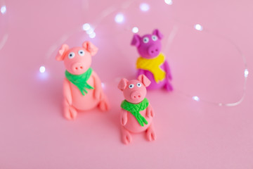 Hand made little plasticine pigs