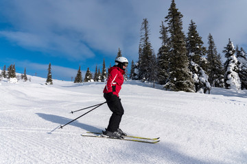 Woman downhill skiing in Lapland Finland