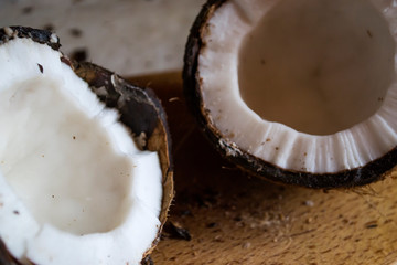 Coconut on a white wooden background.