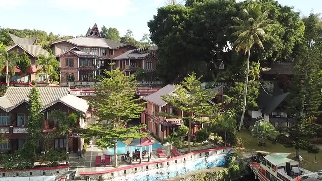 Drone rising at the resort on Samosir island, Lake Toba, Sumatra, Indonesia.