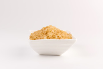 white rice in bowl isolated on white background