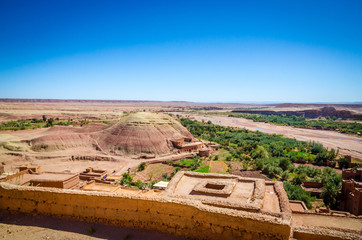 Aerial view on Kasbah Ait Ben Haddou and desert near Atlas Mountains, Morocco