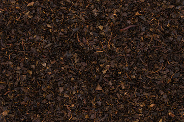 Black leaf tea background.