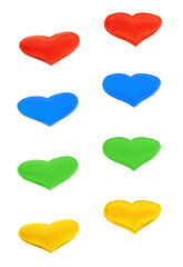 Multicolored hearts in height on an isolated background, wallpaper or texture
