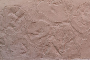Abstract texture of pink color. Stone wall with cement. Old painted surface.
