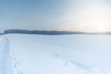 Winter landscape at sunrise