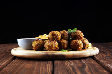 Traditional homemade hummus, falafel and chickpea served with spices on table. Jewish Cuisine.