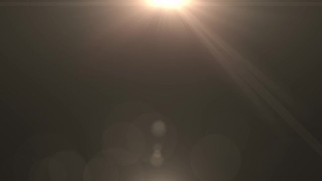 Bright rays radiating from a light bulb on a black background 1920