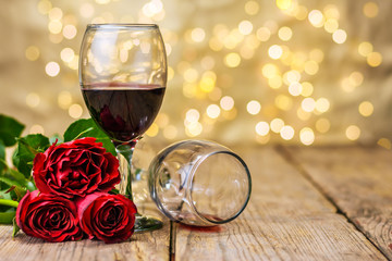 A glasses of wine and roses