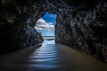 A beautiful photo from inside a sea cave looking out at the ocean