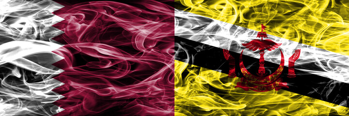 Obraz premium Qatar vs Brunei, Bruneian smoke flags placed side by side. United Arab Emirates. UAE.