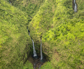 Aerial view of waterfalls in crater of Mount Waialeale on hawaiian island of Kauai from helicopter flight © steheap
