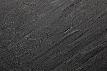 Dark black and grey slate like background or texture