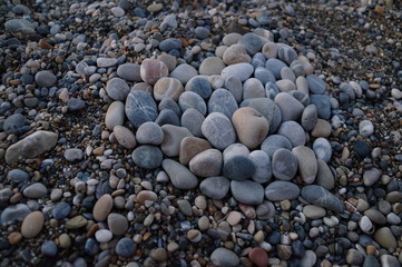 heart made out of beach stones 