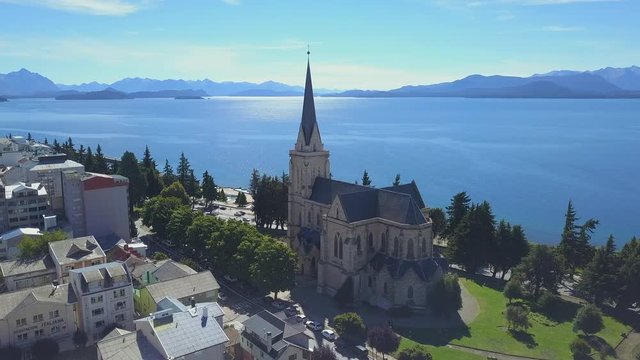 Aerial view of the town of Bariloche with Cathedral of Our Lady of Nahuel Huapi and the lake of Nahuel Huapi. Patagonia, Argentina